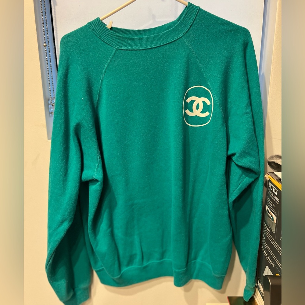 Green sweatshirt with logo